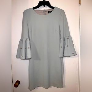 Green dress with statement sleeves